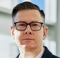 Ejecutivo de empresa de comercio cripto, Alexander Hughes en su rol de CEO, en retrato